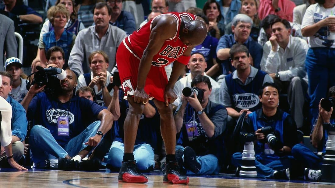 Michael Jordan wearing the Air Jordan 12 Flu Game in the NBA Finals Game 5 vs. the Utah Jazz